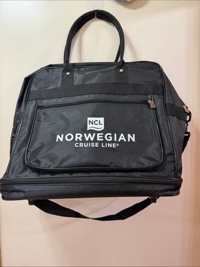 NCL. Norwegian Cruise Line Black Travel Duffel Bag Expandable, Wheels. NWOT